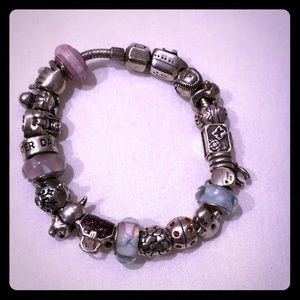 7” Chamilia charm bracelet filled with charms